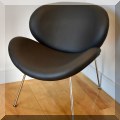 F12. Matrix Imports leatherette and chrome “Spyder” chair. 